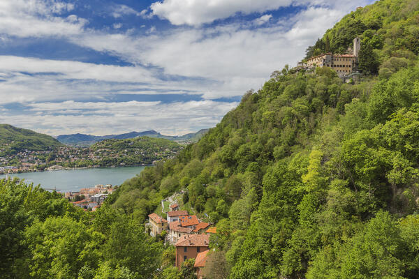 A summer view of lake Como, Brunate, Como city and the St. Donato hermitage (Eremo di San Donato), Lombardy, Italy, Europe