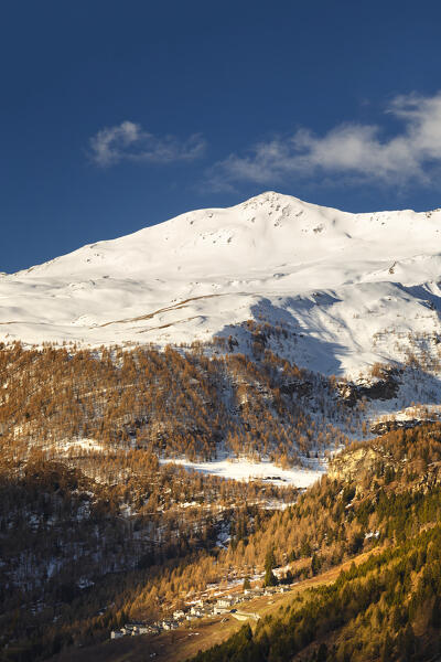 First morning light on Truzzo piz and Starleggia village, Sondrio province, Campodolcino, Spluga valley, Lombardy, Italy, Europe