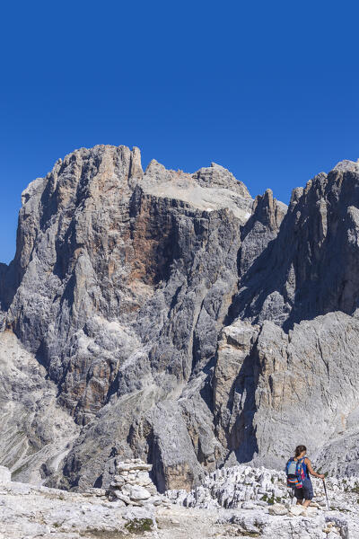 Hiker walks on Cima Rosetta, Dolomites, Parco Naturale di Paneveggio Pale di San Martino, San Martino di Castrozza, Trentino alto adige, Italy, Europe (MR)