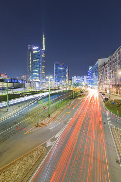 An evening view of Piazza Gae Aulenti with the car trails on Viale Luigi Sturzo road, Milano, Lombardy, Italy, Europe