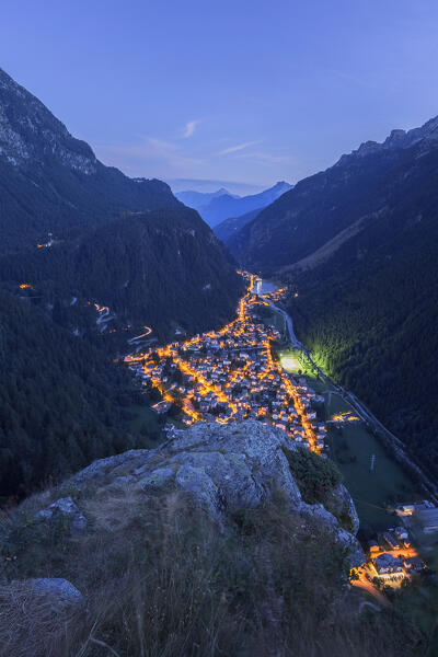 Dusk on Campodolcino village illuminated at evening and Spluga valley, Sondrio province, Lombardy, Italy, Europe