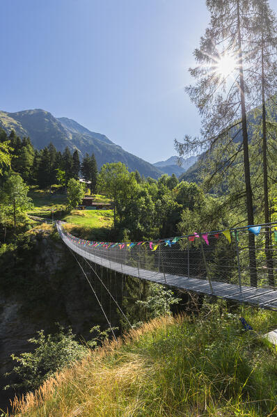 A summer view of Fraciscio with tibetan bridge, Campodolcino, Spluga valley, Sondrio province, Lombardy, Italy, Europe