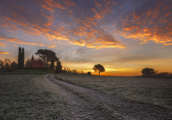 Red sunrise and frost on the hills of Pomelasca, Inverigo, Como province, Brianza, Lombardy, Italy, Europe