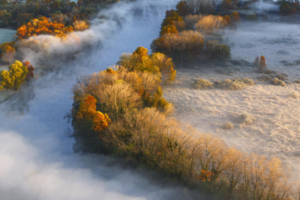 The mists of Adda river, Airuno, Adda Nord park, Lecco province, Brianza, Lombardy, Italy, Europe