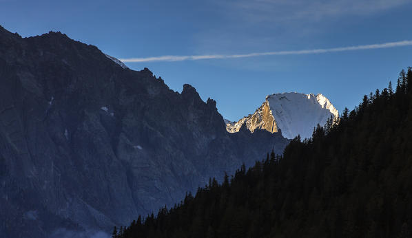 First lights on Badile Piz, Engadine, Canton of Graubunden, Switzerland, Europe