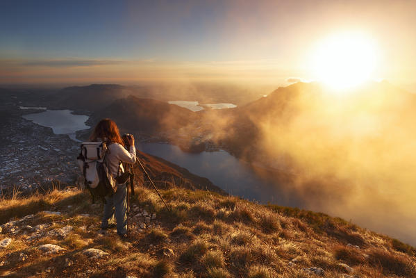 Photographer capture a sunset over Lecco, lake Como, Lombardy, Italy, Europe