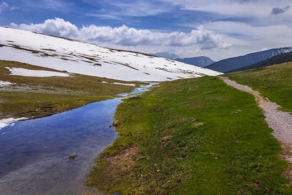 Last snow on park Puez, Funes valley, Bolzano province, South Tyrol region, Trentino Alto Adige, Italy, Europe