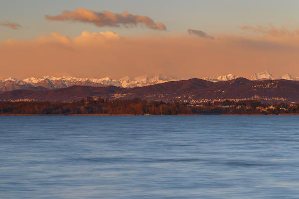 Sunrise on Biandronno and alps from lake Varese, Varese province, Lombardy, Italy, Europe
