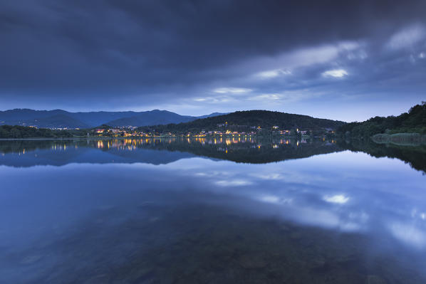 Lights of Montorfano reflected on his lake, lake Montorfano, Como province, Brianza, Lombardy, Italy, Europe