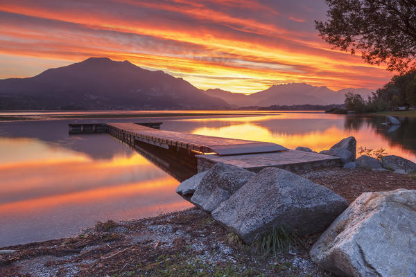 Lecco mountains on fire, sunrise on lake Pusiano, Como and Lecco province, Brianza, Lombardy, Italy, Europe