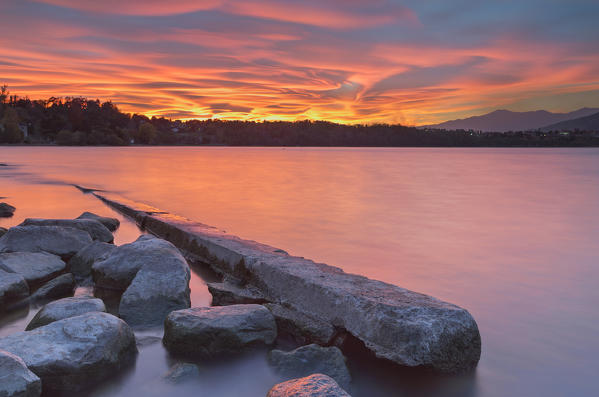 Incredible sunset of lenticular clouds on Lake Annone, Annone di brianza, Lecco province, Brianza, Lombardy, Italy, Europe