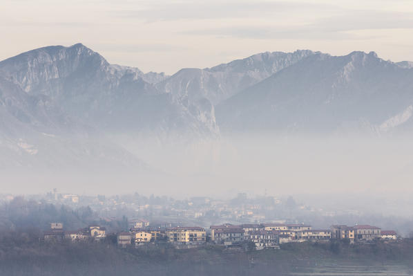 Foggy sunrise on Costamasnaga and Lecco mountains, Brianza, Lecco province, Lombardy, Italy, Europe
