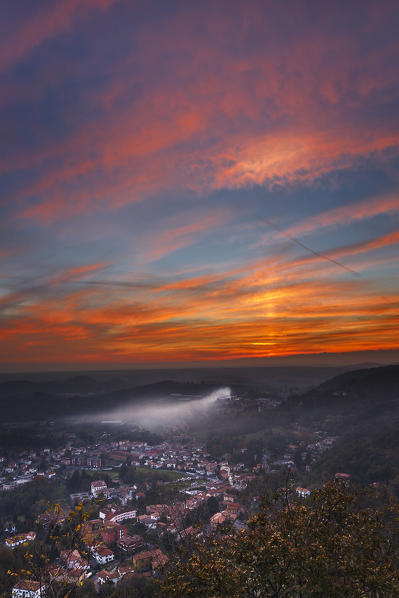 Red sunset on Cavallasca city, Como province, Lombardy, Italy, Europe