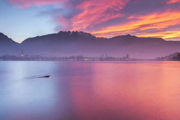 Fire sunrise on Lecco and mountains, lake Como, Lombardy, Italy, Europe