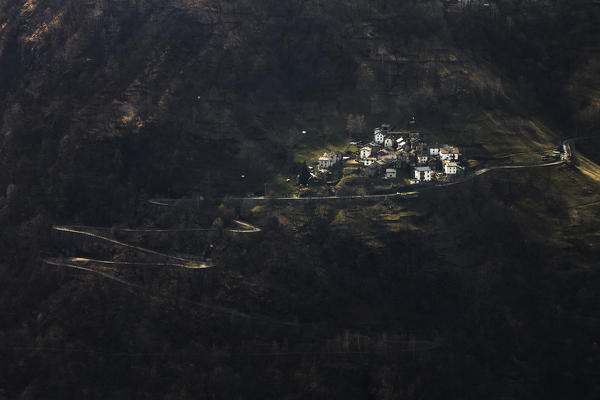 Motta, small village between lights and shadows, San Giacomo Filippo, Sondrio province, Chiavenna valley, Lombardy, Italy, Europe
