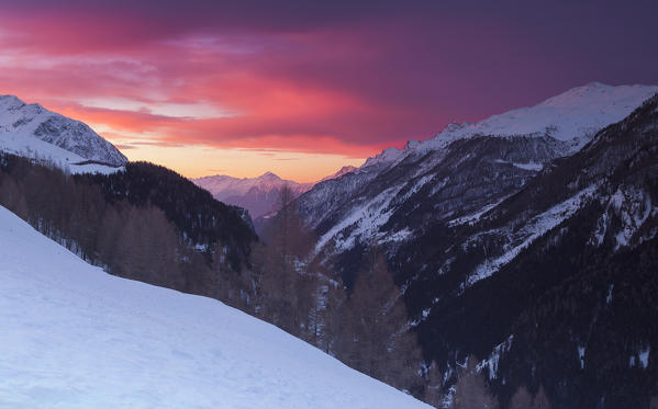 Red sunset on snowy Spluga valley, Madesimo, Sondrio province, Lombardy, Italy, Europe