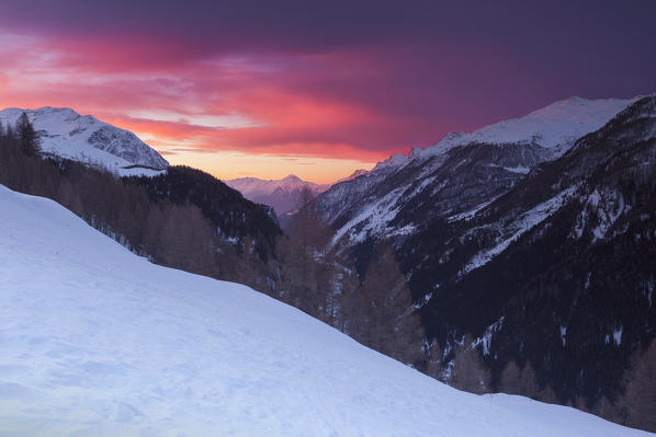Red sunset on snowy Spluga valley, Madesimo, Sondrio province, Lombardy, Italy, Europe