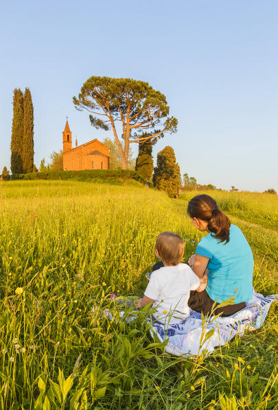 Mom with her daughter admire Pomelasca church, Inverigo, Como province, Brianza, Lombardy, Italy, Europe (MR)