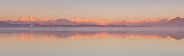 Panoramic of sunrise on Rosa Mount and Alps reflected in Varese lake, Varese province, Lombardy, Italy, Europe
