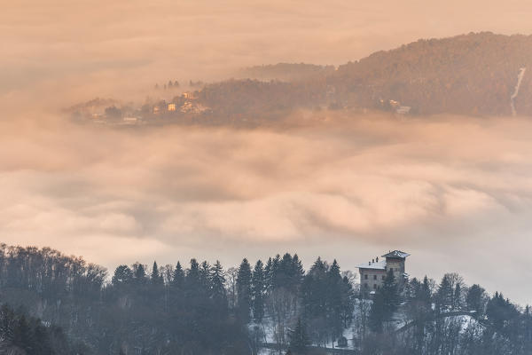 Como and Spina Verde rise up from a sea of clouds at sunrise, Como province, Lombardy, Italy, Europe