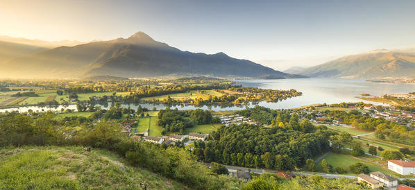 First light on Legnone mount, Sorico village, lake Como, Como province, Lombardy, Italy, Europe