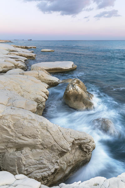 Cyprus, Limassol, The crystal water and the white rocks of Governor’s Beach at sunrise