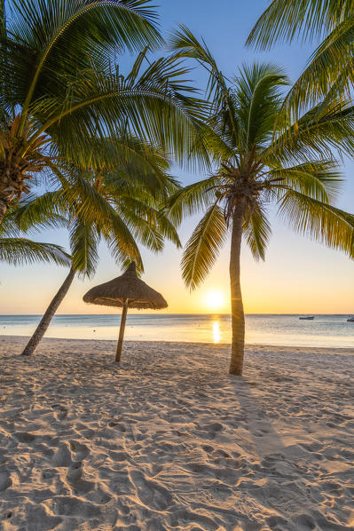 The beach of the Beachcomber Paradis Hotel at sunset, Le Morne Brabant Peninsula, Black River (Riviere Noire), Mauritius (PR)