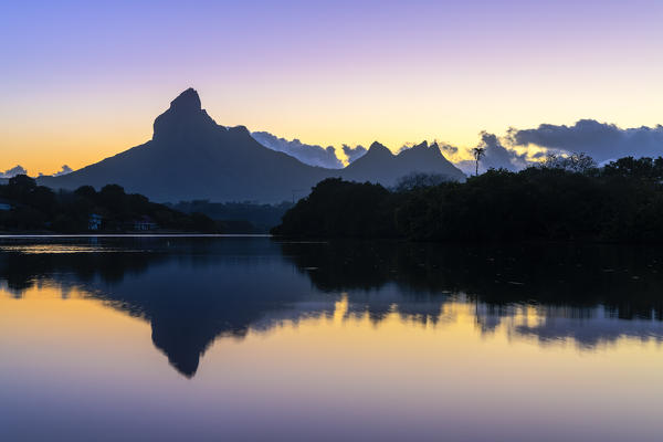 Rempart mountain reflected in Tamarin bay. Tamarin, Black River (Riviere Noire), Mauritius, Africa
