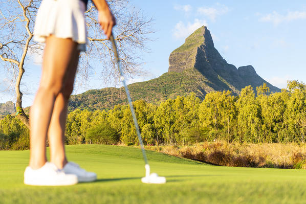The golf course of the Tamarina Golf club with Rempart mountain in the background. Tamarin, Black River (Riviere Noir), Mauritius, Africa (MR)
