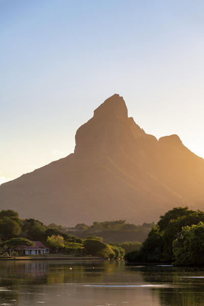 Sunrise at Tamarin bay with Rempart mountain in the background. Tamarin, Black River (Riviere Noir), Mauritius, Africa