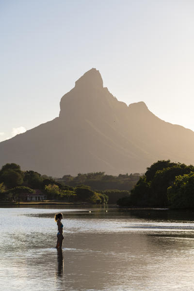 Sunrise at Tamarin bay with Rempart mountain in the background. Tamarin, Black River (Riviere Noir), Mauritius, Africa