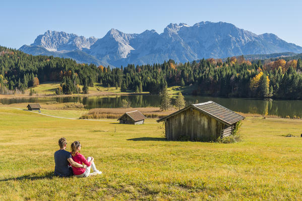 Gerold, Garmisch Partenkirchen, Bavaria, Germany, Europe. A couple admiring the view in Gerold