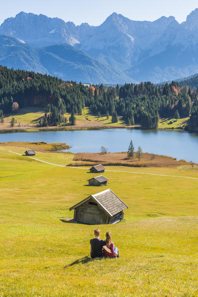 Gerold, Garmisch Partenkirchen, Bavaria, Germany, Europe. A couple adrmiring the view at Gerold