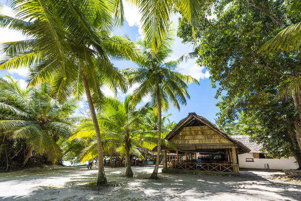 People eating out at the restaurant on Anse Lazio beach. Praslin island, Seychelles, Africa