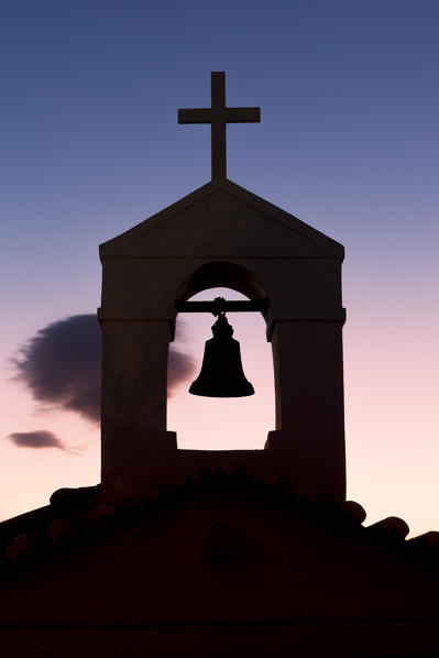 Bell tower silhouette at sunrise, Andros, Cyclades Archipelago, Greece, Europe