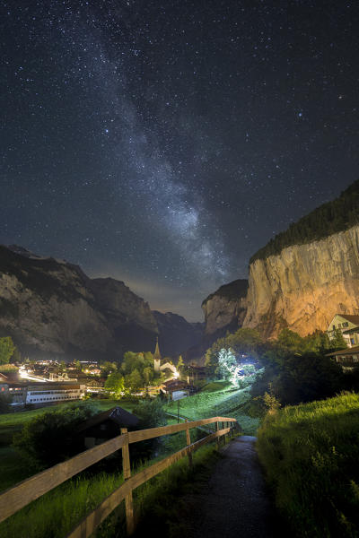 Village of Lauterbrunnen at night with the milky way in the background,Interlaken-Oberhasli administrative district, canton of Bern,Bernese Oberland, Switzerland.