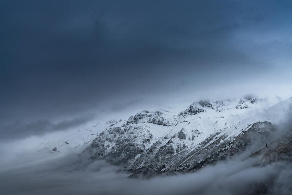 Gran sasso into the snow trough the clouds, Campo Imperatore, L'Aquila province, Abruzzo, Italy, Europe