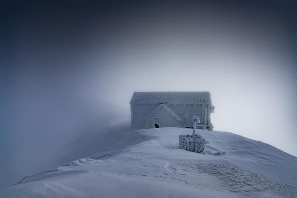 Rifugio Duca degli Abruzzi in the mist covered with ice, Campo Imperatore, L'Aquila province, Abruzzo, Italy, Europe