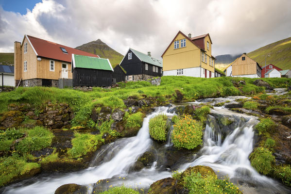 The little village of Gjogv and its stream, Eysturoy island, Faroe Islands, Denmark, Europe