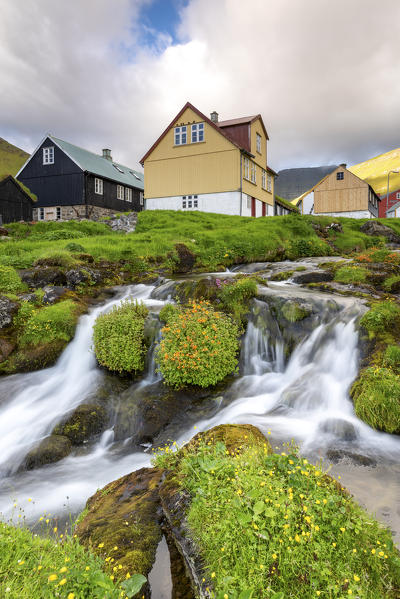 The little village of Gjogv and its stream, Eysturoy island, Faroe Islands, Denmark, Europe