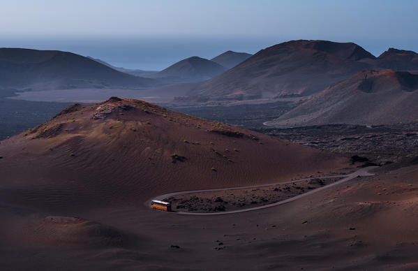 A bus on the road of Timanfaya National Park, Lanzarote, Canary Island, Spain,Europe