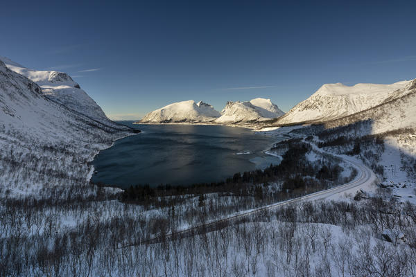panoramic view in cold winter morning in Bergsfjorden, Senja, Northern Norway, Europe.