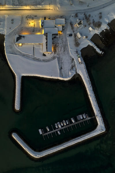 aerial view taken by drone of the Skaland harbour, Bergsfjorden, Senja, Northern Norway, Europe.