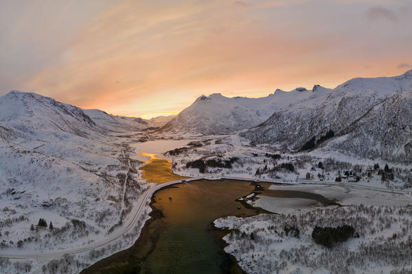 Aerial amazing sunset in winter day at Austnesfjorden, Lofoten island, Northern Norway, Europe