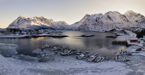 panoramic aerial view of little fisherman harbour in cold winter morning, Austnesfjorden, Lofoten island, Northern Norway, Europe