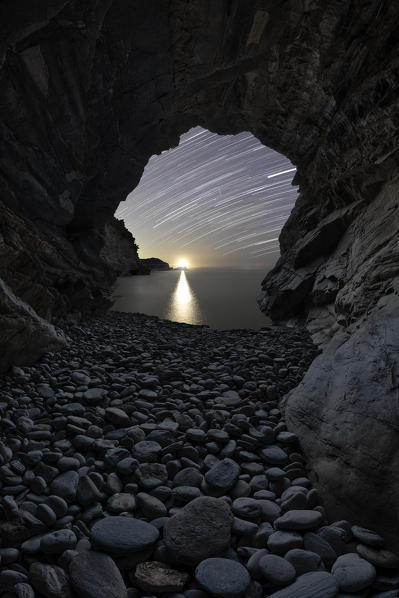 startrail from the cave, overlooking the island of Palmaria, Porto Venere, La Spezia province, Liguria district, Italy, Europe