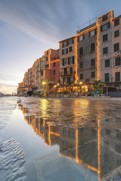 long exposure to capture the sunset a Portovenere, with the houses reflected in the pool, World Heritage Site, La Spezia province, Liguria district, Italy, Europe.