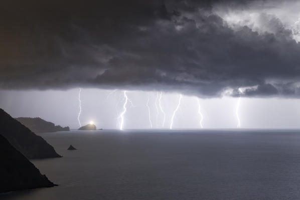 an impressive summer lightning storm is about to hit the Isle of Tino, municipality of Portovenere, La Spezia province, Liguria district, Italy, Europe