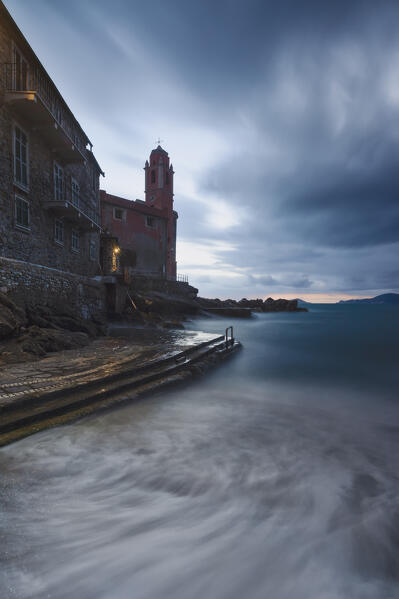a long exposure to capture the cloudy sunset at Tellaro, municipality of Lerici, UNESCO World Heritage Site, La Spezia province, Liguria district, Italy, Europe