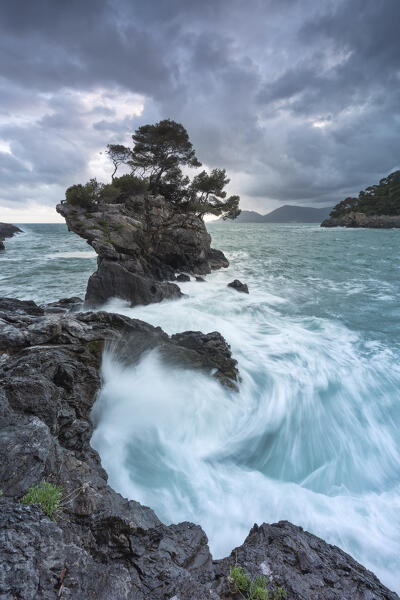 the waves create a vortex along the cliffs near Tellaro, municipality of Lerici, La Spezia province, Liguria district, Italy, Europe